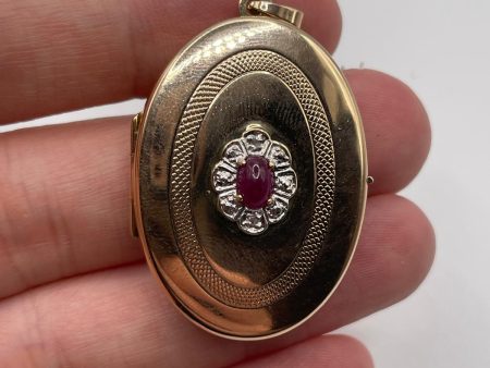 9ct gold cabachon ruby and diamond locket Cheap