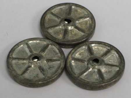 Pressed tin wheels 1-3 16  x 1 8  Supply