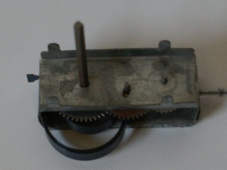 Vintage clockwork toy windup motor 2-1 8 x 13 16  For Sale