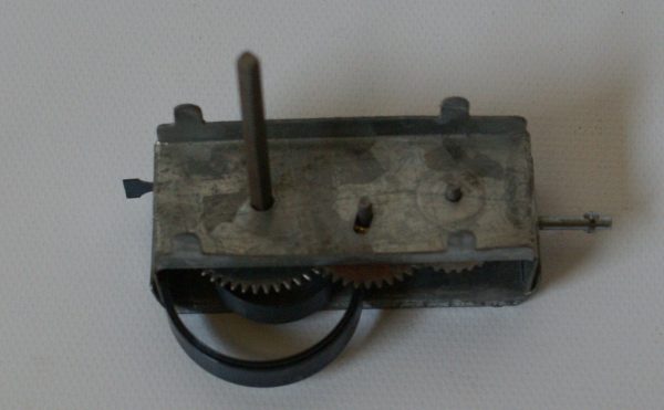 Vintage clockwork toy windup motor 2-1 8 x 13 16  For Sale