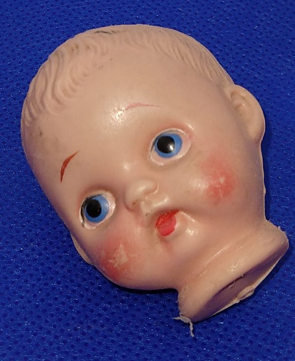 Vintage plastic doll head 2  x 1.5   Original condition. Sold for parts only. For Sale